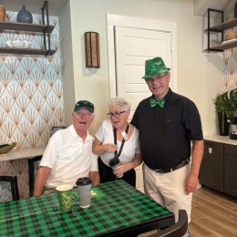 three people posing for a picture